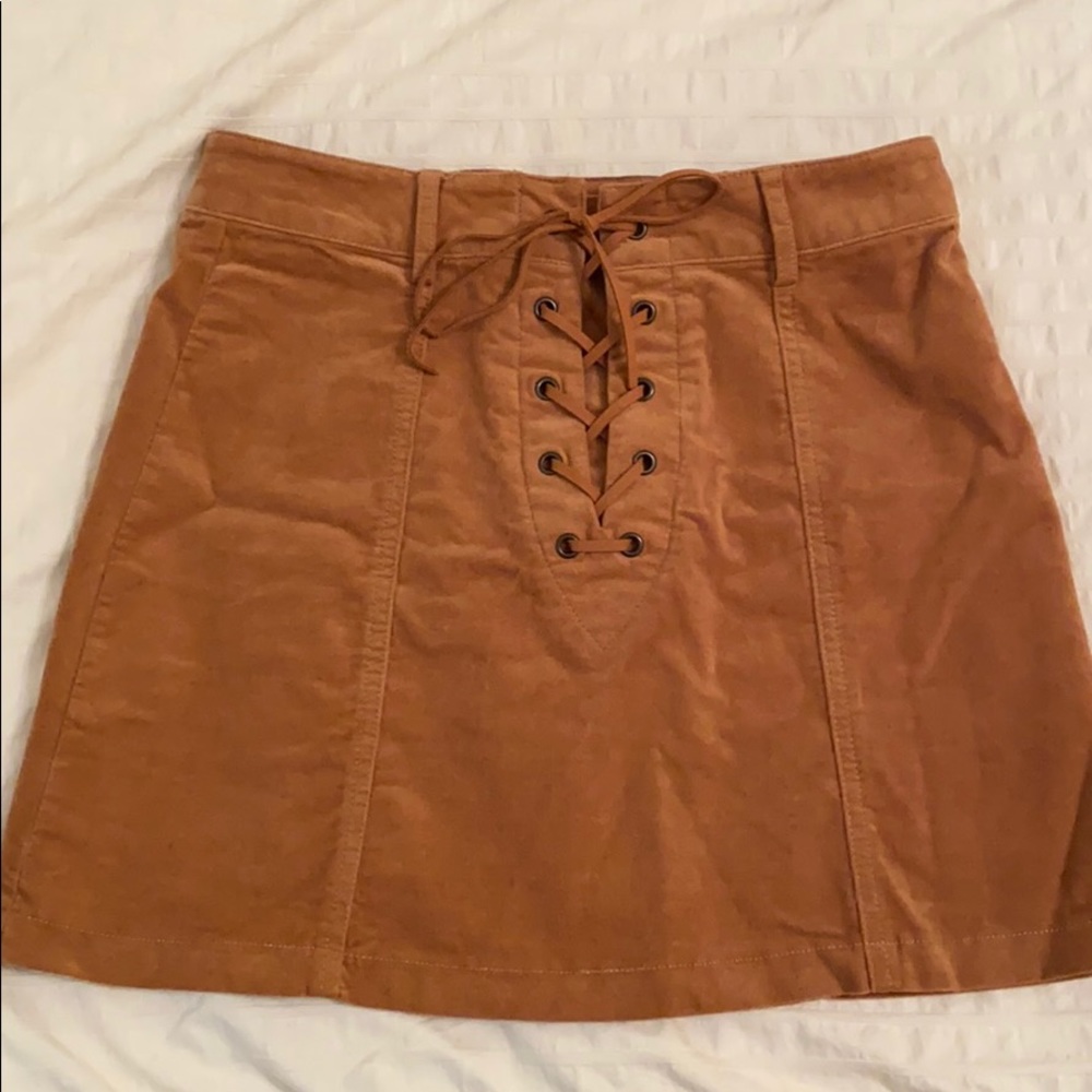 Tan mini skirt tied laces front and zipper back